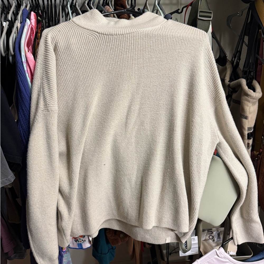 Lululemon Athletica Cream Turtleneck Sweater with Ribbed Texture. Merino Wool